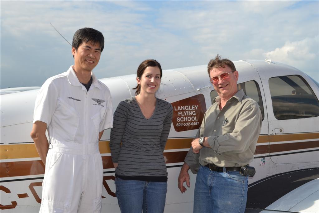 Allison Heathcote with John Laing and her Flight Instructor, Hoowan Nam after the completion of her Private Pilot Flight Test.  Langley Flying School.