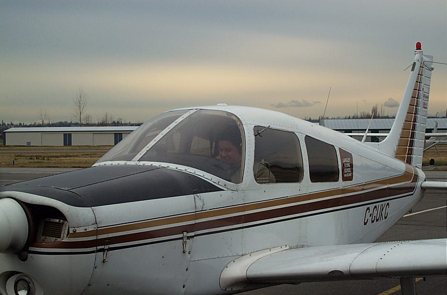 Carlos Calderon Gutierrez in Cherokeed GUKG after the successful completion of his First Solo Flight on January 15, 2008.  Langley Flying School.