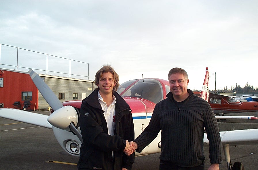 Darren Kroeker with Pilot Examiner Jim Scott following the successful completion of his Private Pilot Flight Test on January 23, 2010.
