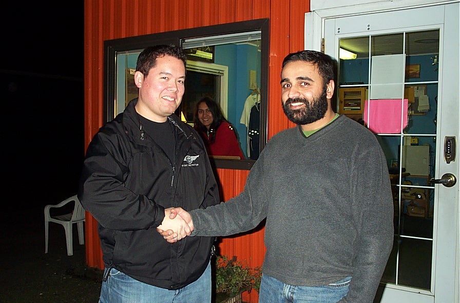 Commercial Pilot Gobind Sandhanwalia receives contratulations form Flight Instructor Justin Chung after the successful completion of Gobind's Group 1 (Multi-engine) Instrument Rating Flight Test on November 29, 2007.  Langley Flying School. 