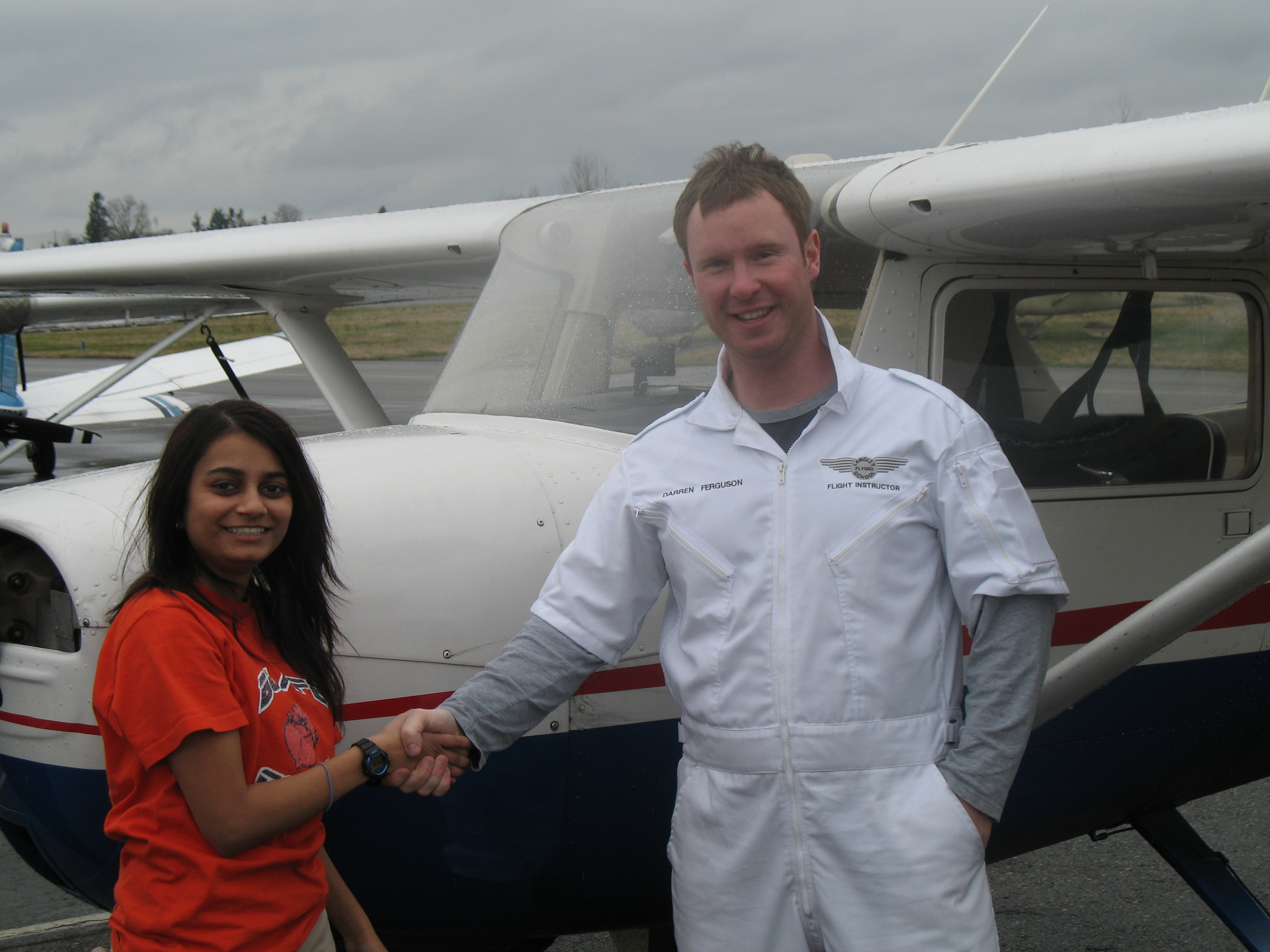 Khushbu Patel with Flight Instructor Darren Ferguson after completing her First Solo Flight on March 23, 2008.  Langley Flying School.
