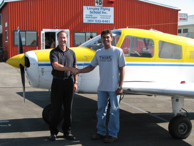 Mohit Goyle with Jeff Durand after successfully completing his Private Pilot Flight Test in Cherokee GUGK on August 6, 2007.  Langley Flying School