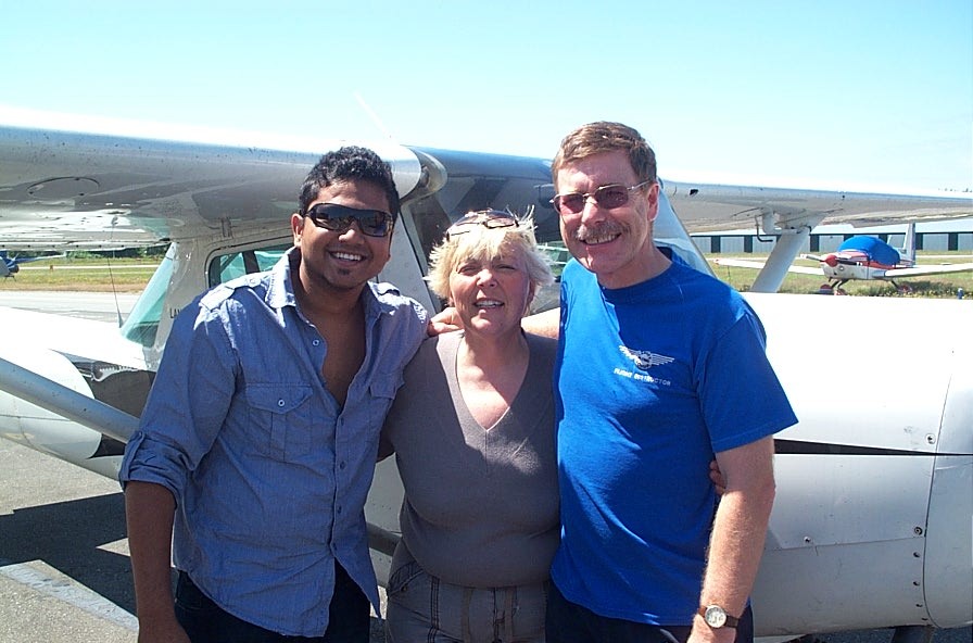 Commercial Pilot Graduate Pankaj Salve with Pilot Examiner Karen Douglas and Flight Instructor Peter Waddington after the successful completion of Panks' ride on July 8, 2008.  Langley Flying School.
