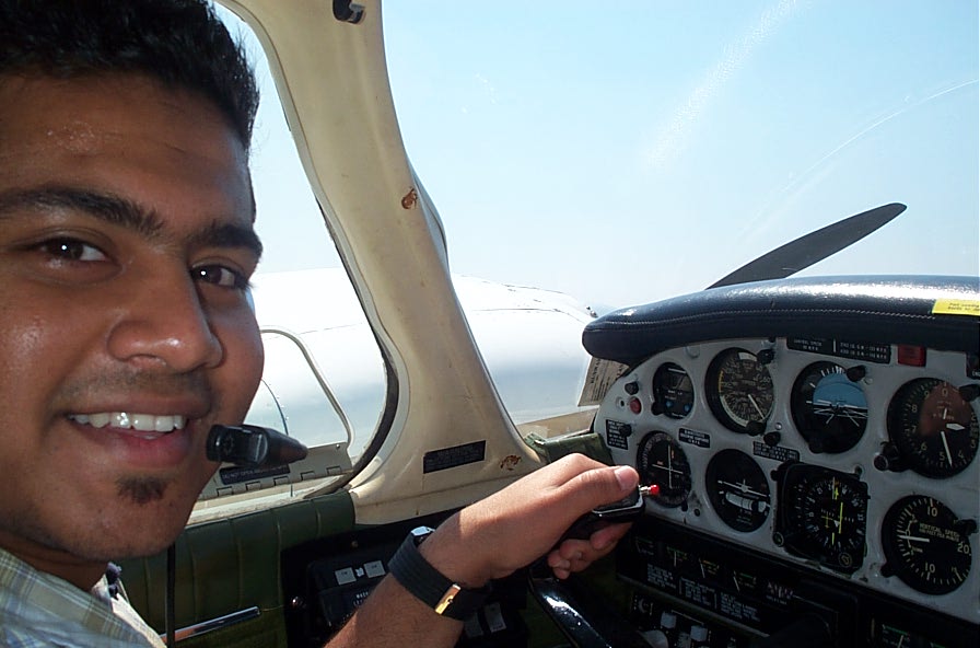 Pankaj Salve at the controls of the Piper Seneca during an engine shut-down exercise.  Langley Flying School