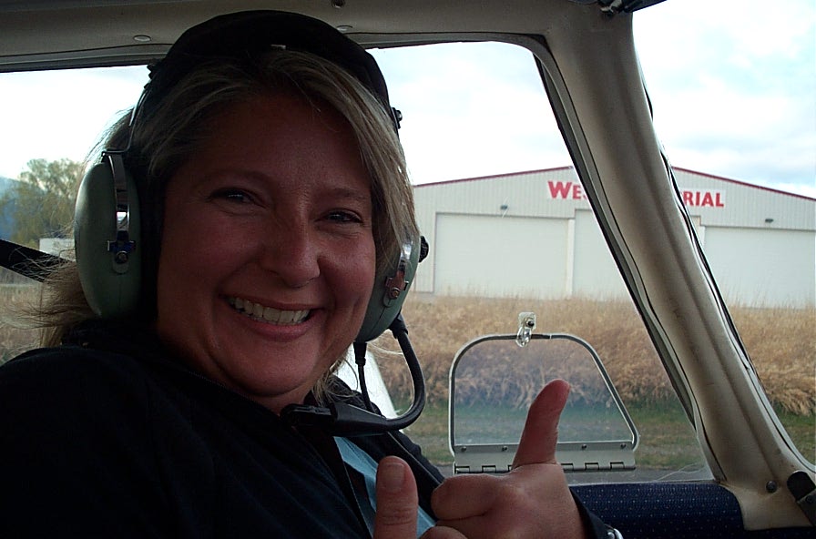 Student Pilot Sandy Wade in the cockpit of Cherokee GCEP after the completion of her First Solo Flight on March 8, 2010.  Langley Flying School.